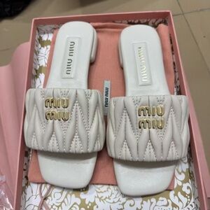 Miu Miu Quilted Ivory Slide Sandals with Gold Logo